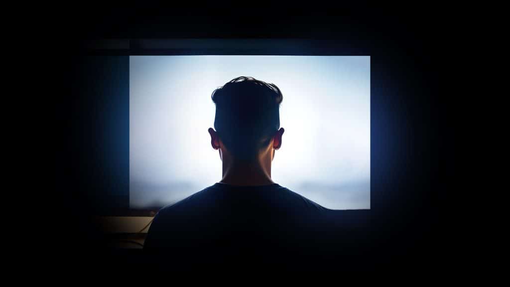 Man looking at a computer screen